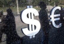 Долар почав невеликий ріст на фоні надії інвесторів, — Reuters